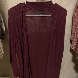 Long sleeved cardigan sweater with pockets! Color is maroon!